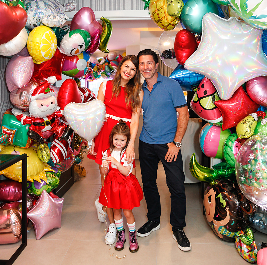 Corri McFadden and family throw their daughter a birthday party at the Swissotel with a Christmas in July theme.