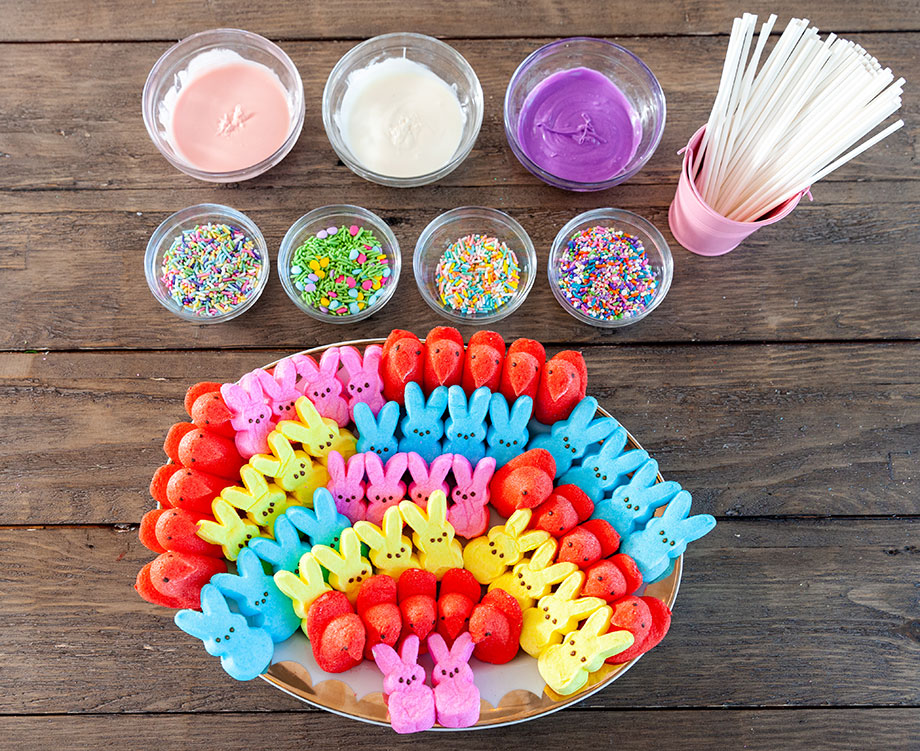 A table filled with frosting and peep ingredients.